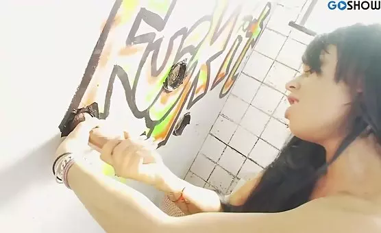 Kneeling Brunette Pleasures Wall Cock through Mouth